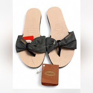 Havaianas Women's You St.Tropez Shine flip flops black bow & beige sole.